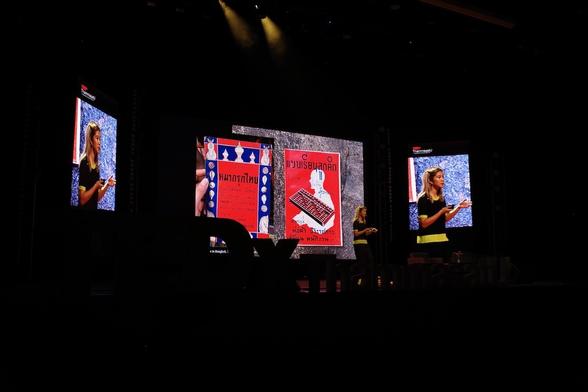 Boom speaking at TEDx ThammasatU, with some typographic ephemera