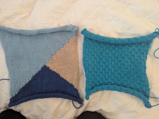 A photo of two knitted squares. The right one is a teal color with texture. The left one has three triangles in shades of blue and beige.
