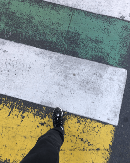 Me crossing on a rainbow crossing in Brussels