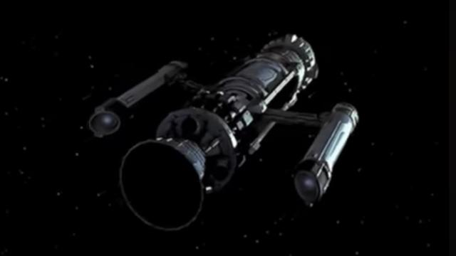 The Phoenix, a fictional prototype warp-capable spacecraft made from a nuclear missile, is seen with two warp nacelles extended on either side and faint light is seen as the warp engines “ignite”.