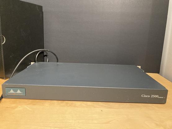 The front of a Cisco 2512 router, in a 1 Unit form factor.