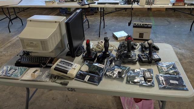 CGA CRT monitor, 5x4 17" LCD monitor, many joysticks and gamepads, commodore manuals and datasette, multiple apple II and PC cards in mylar bags.