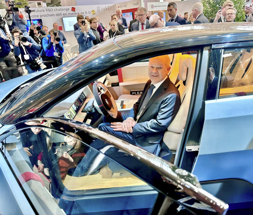 Olaf Scholz, the outgoing German Chancellor sits in a prototype electric car made of all Canadian components. The car, dubbed Project Arrow, contains components of more than 50 Canadian supplies. (Simon Gill)