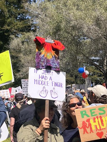 At Hands Off rally in Santa Cruz a protester held a sign that said If Jerry had a middle finger with a drawing of a handing giving the middle finger.
