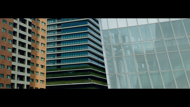 Sections of three buildings in Toranomon, Tokyo, yesterday. One orangey stone and concrete, another glassy with greens and blues the main colour palette. The last, a part of the Station Tower, is shades of greyish glass. Shot with the 65x24 app from Heliographe.