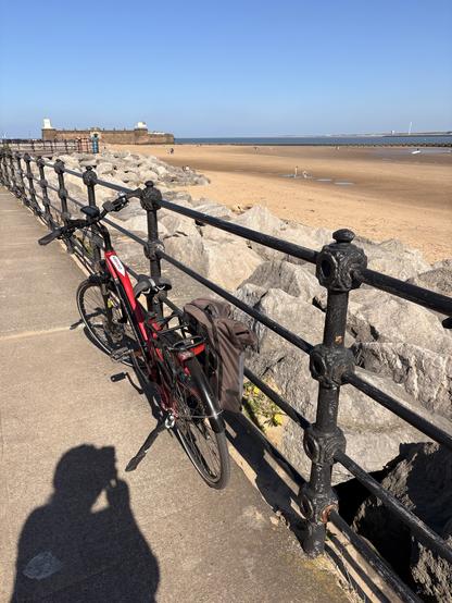 My bike by the beach looking out into the Mersey Estuary and towards the Irish Sea.