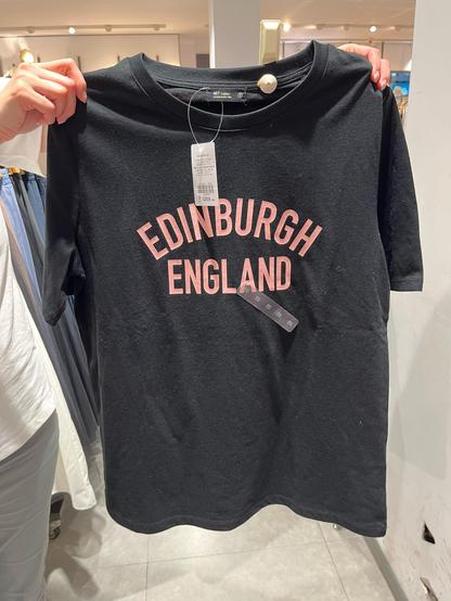 A tee shirt with Edinburgh England on it.