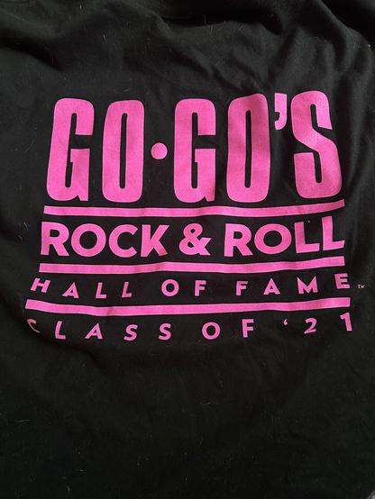 T-shirt that says
GO GOS
 ROCK & ROLL
 HALL OF FAME™
 CLASS OF '21.