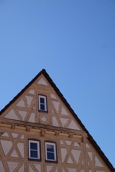 A beautiful half -timbered House in southern Germany. In the background sunny blue skies without any clouds.