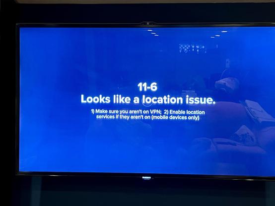 A digital screen displays a message indicating a location issue, listing two troubleshooting steps: 1) Ensure the device is not on VPN; 2) Enable location services if they are disabled (for mobile devices only).