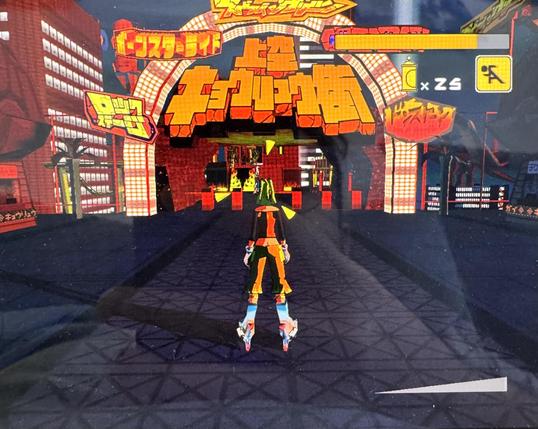 Screenshot of comic style 3D game showing a female character in front of the entrance of a japanese theme park.