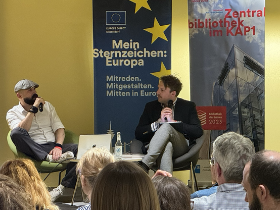 Bastian Schlange & Gabin Karlmeier diskutieren
