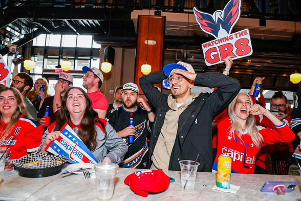 Fans look on in awe at the Gr8Chase Watch Party.
