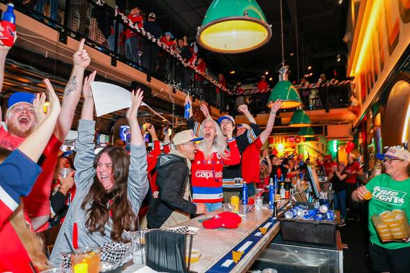 Fans celebrate Alex Ovechkin reaching 895th career goal.