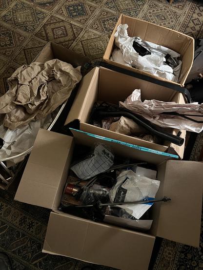 Boxes of restored parts waiting for assembly