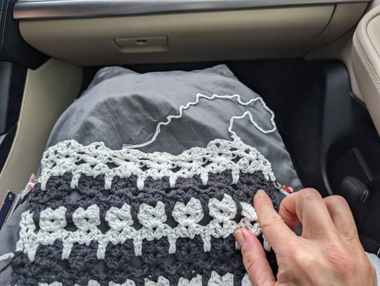 I missed the first leg in the first stitch row of this current white row of cats, which meant I had to frog alllllll the way back to it and redo that top row of cats