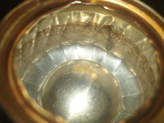 Réchaud à alcool en canette alu à capillarité.
on voit bien les plis à l'intérieur de la canette