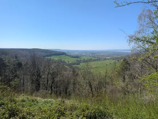 An image of various hills, with Stonehouse visible in the upper half of the image (albeit very small) and barely being able to make out a Severn bridge near the top