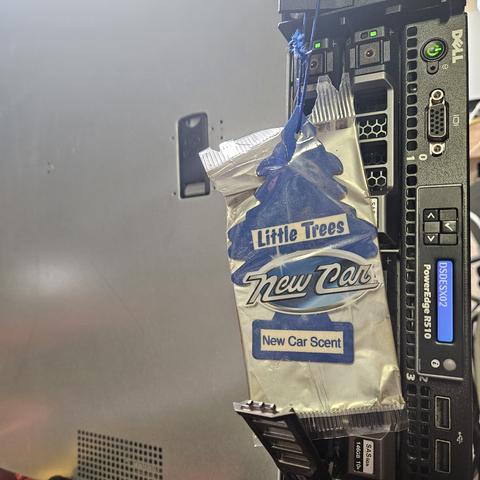 a camera image of my dell poweredge server with a little trees new car scent hung on the blade puller flip up handle.