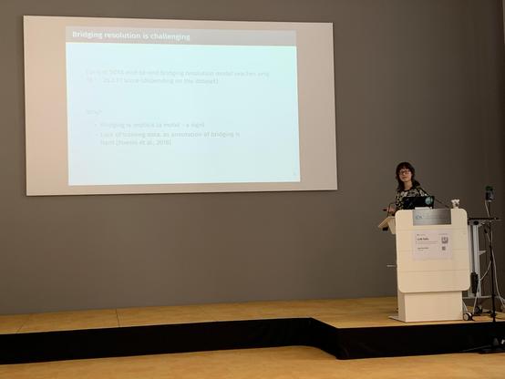 Skachkova in front of her slides