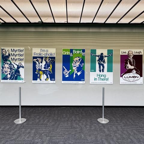 Inspirational posters inspired by Season 2 of Severance in the main Atrium of Bell Works.