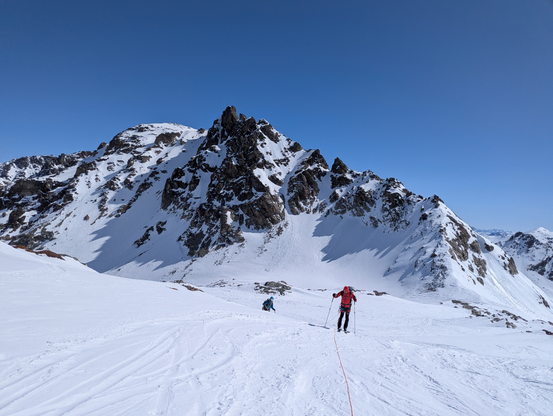 Skier approaching saddle.