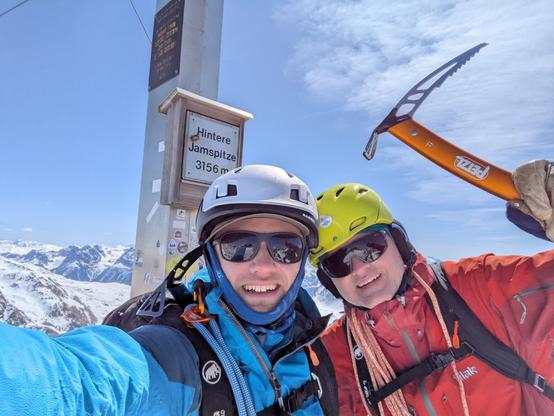 Like father like son. Together on the top of the mountain.