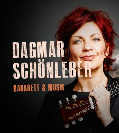 Portrait von Dagmar Schönleber mit Gitarrenhals.