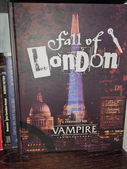 A hardcover book, the cover showing a composite cityscape of London