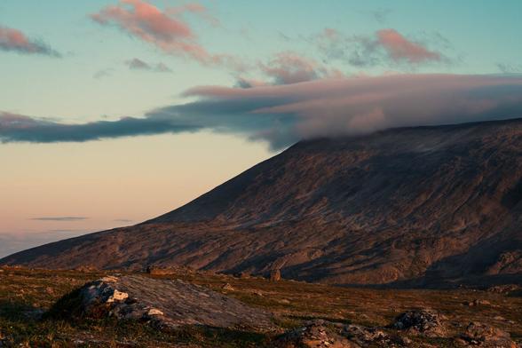 Photo capturing the beautiful light and long shadows on the fjells during late summer, fall, or spring in the Nordics.