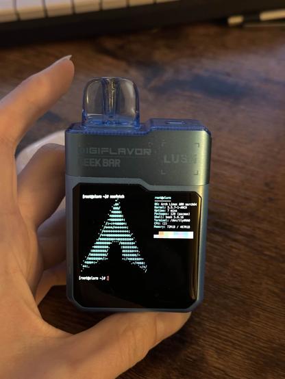 An ecig display showing the output of neofetch (it runs arch btw)