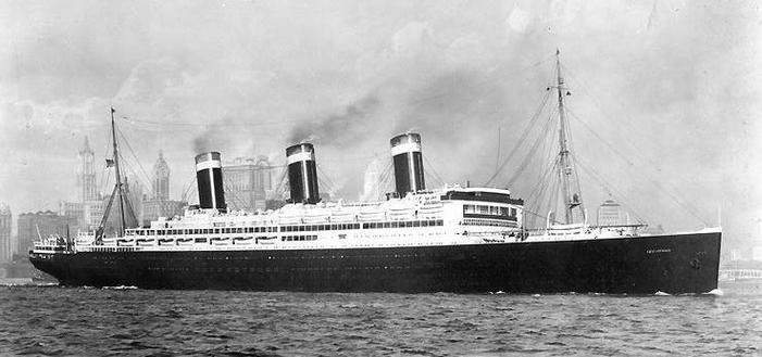 USS Leviathan Steaming out of New York Harbor, circa the mid-1920s. This photo is in the public domain via Wikicommons.