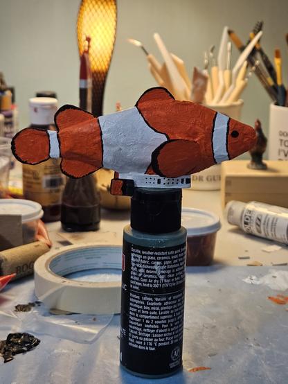 Side view of clownfish derigible.   The passenger compartment and engines are just below the fish body.