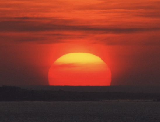 “Erupting with beauty and power...”. WOWW!! . An awesome lava-like ‘saharan dust sunrise’ ascends over Garrettstown beach in West Cork , Ireland on an amazing April morning!