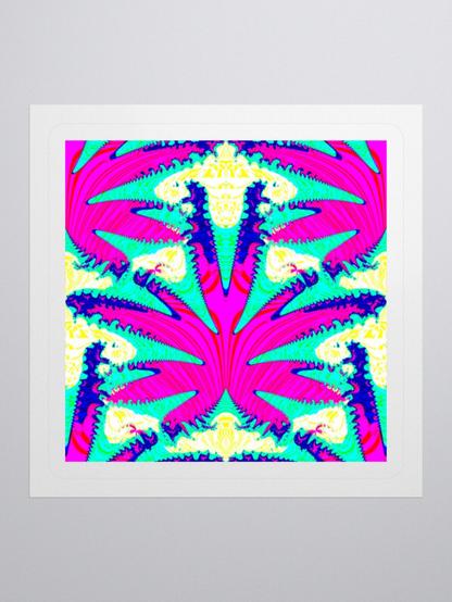 A square shaped sticker with some cannabis leaf art that I created in shades of pink, blue, green, yellow, red, and white. There's a white border around the edges of the sticker. Light gray background.