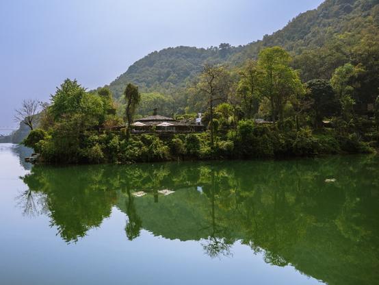Lush green mountains and Ratna Mandir former palace on the shore of Phewa Lake reflected in the calm water, Pokhara, Nepal
Captured by Komeil Karimi