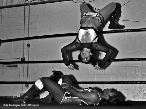 Kasey Catal mid moonsault over Aja Perera