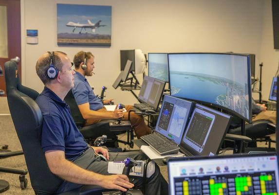 Researchers_at_the_controls_of_the_air_taxi_simulators_(LRC-2024-H1_P_2040_AMP-0932).jpg