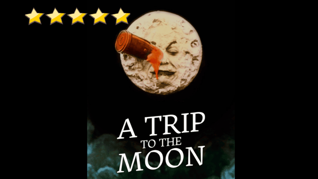 movie poster for A Trip to the Moon showing the iconic moon face with the rocket crashed into its eye