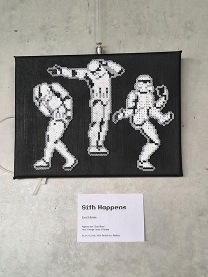 Three storm troopers made out of Hama mini beeds glued on a little canvas, painted black. Storm troopers are soldiers from the movie Star Wars. Their armor is black and white. Shadows are grey beads.