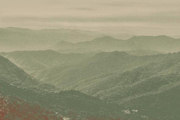 Dithered image of a mountainscape.