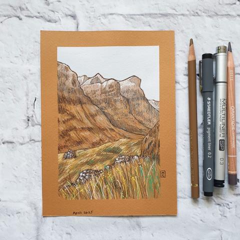 A small drawing of the Three Sisters of Glencoe. A highland mountain scene. The drawing is on terracotta coloured paper. It measures 5 by 7 inches.
The Three Sisters of Glencoe are among the most iconic and breath taking sights in the Scottish Highlands. These three towering ridges dominate the landscape of Glencoe, offering a dramatic and awe-inspiring view.
An original art work
Colour pencil and mixed media on acid free toned artist paper
5 by 7 inches (12.7 by 17.8 cm).
Sold unframed