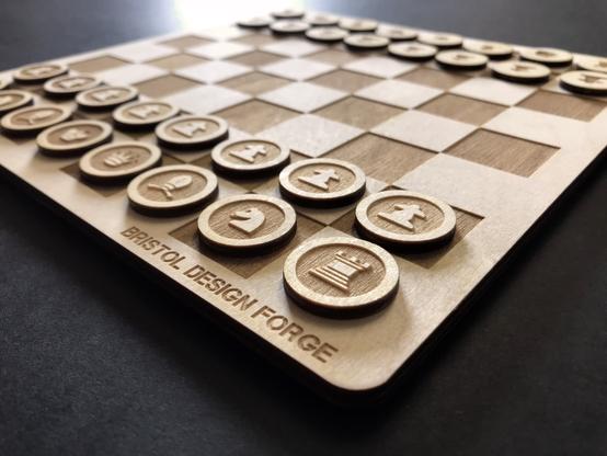 Laser cut chess board and pieces. Nice and minimal. Made of pale wood.