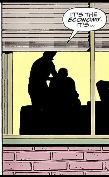 As seen from outside a window with the blinds a third of the way down we see the silhouette of a man with slumped over her shoulders setting, and the silhouette of a woman behind him, resting her hands on his shoulders. She says, “It’s the ECONOMY. It’s….“