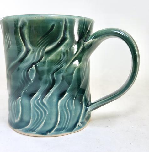 handmade mug with grooves