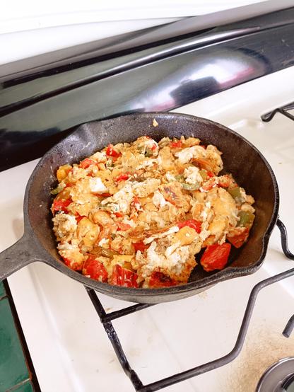 Scrambled eggs on cast iron pan
