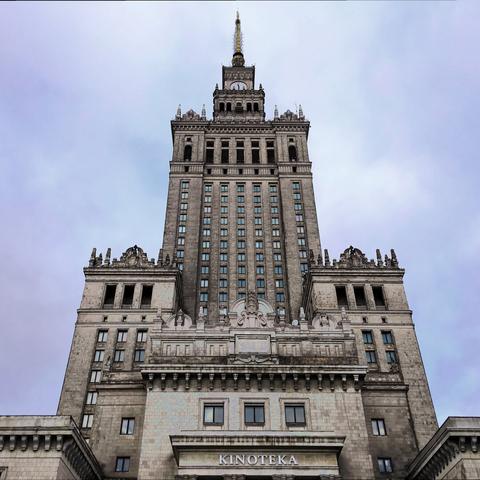 Low-angle view of the palace’s tower with the Kinoteka movie theater on the first floor.