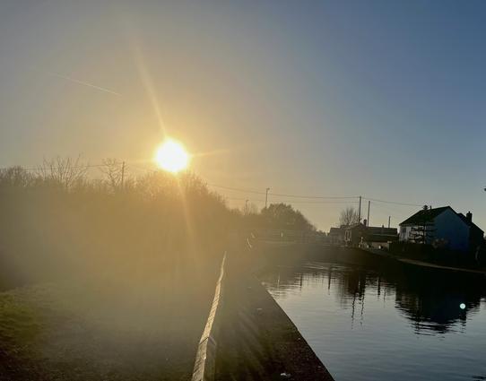 Loved the look of the canal and lock from the towpath as the sun was setting with a bit of lens flare.