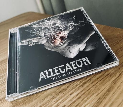 Allegaeon Coverart of The Ossuary Lens - a naked female statue diving in water