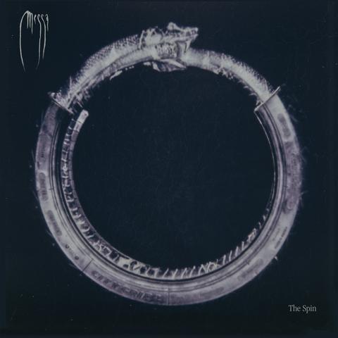 Messa's THE SPIN album cover, has a black background and their band logo in the top left. The main image is a gray-scale circle that is made from metal(?) of a snake eating it's own tail, that also has a motorcycle tire covering parts of it? It's "eerie."